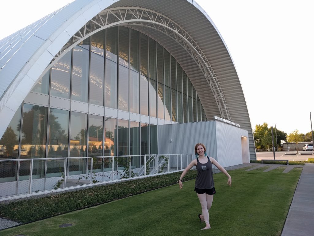 blogger pictured outside the same dance center building